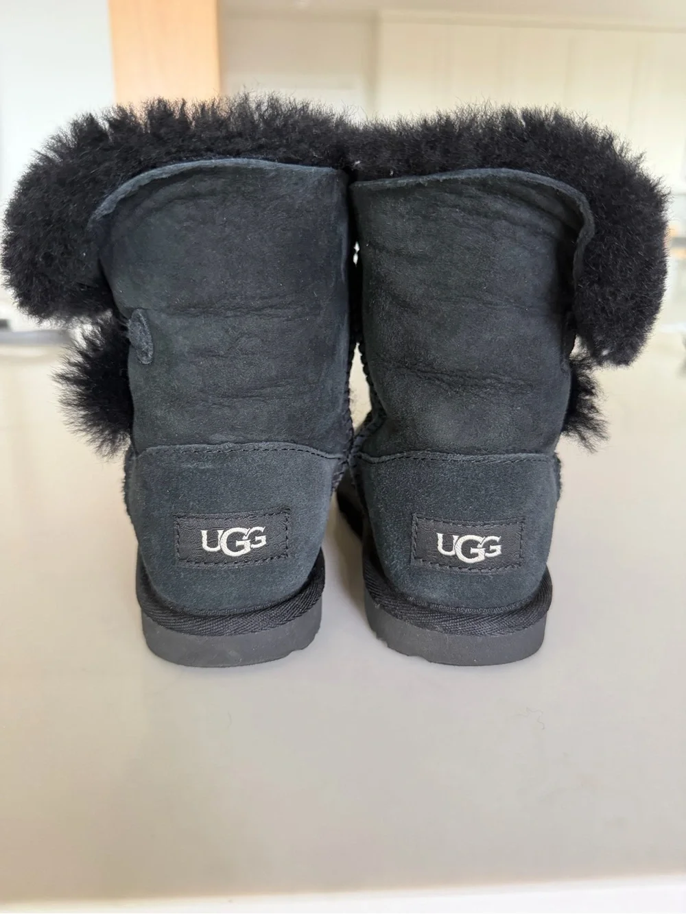 UGG Kids Mini Bow Back Boots in Black Size 12 (only worn twice)